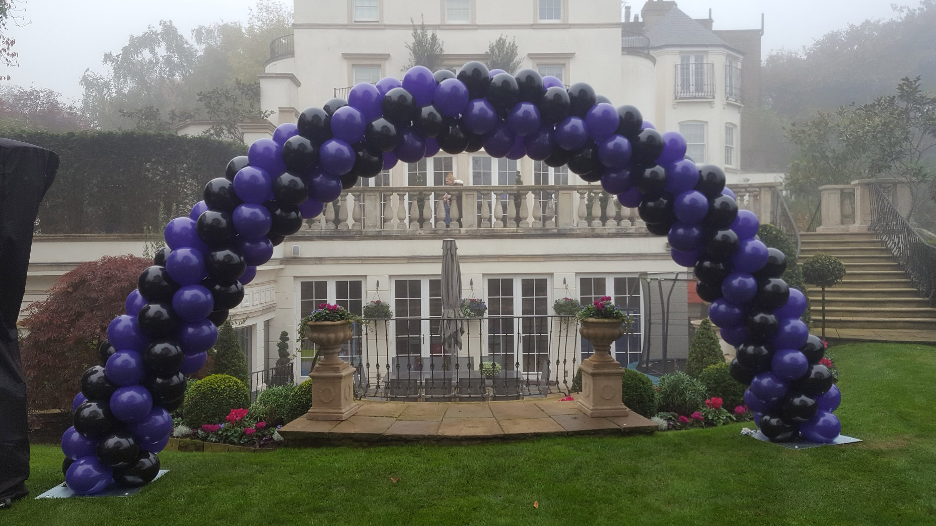 Purple and Black Spiral Balloon Arch