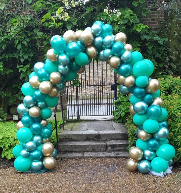 Organic Green and Gold Balloon Arch created for Chelsea Physics Garden